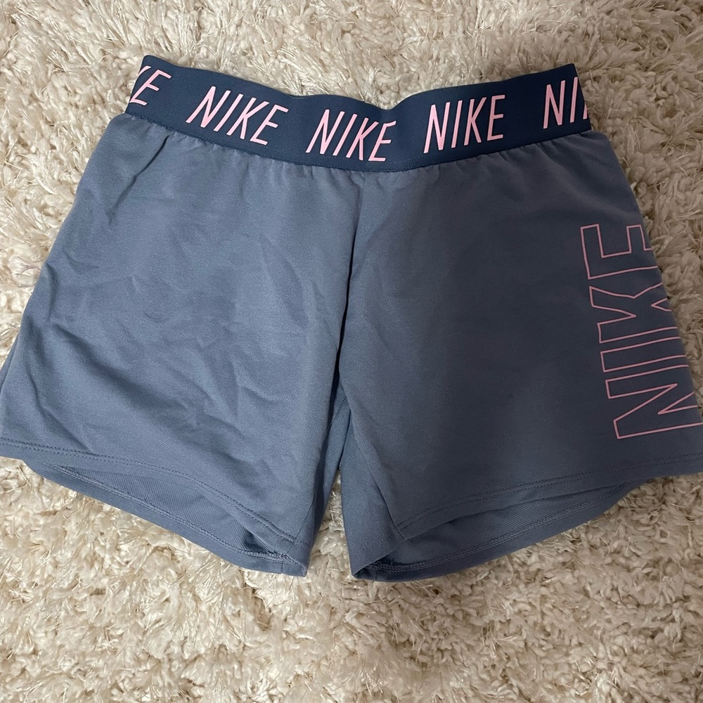 blue nike shorts, child large but fits women’s small, good condition